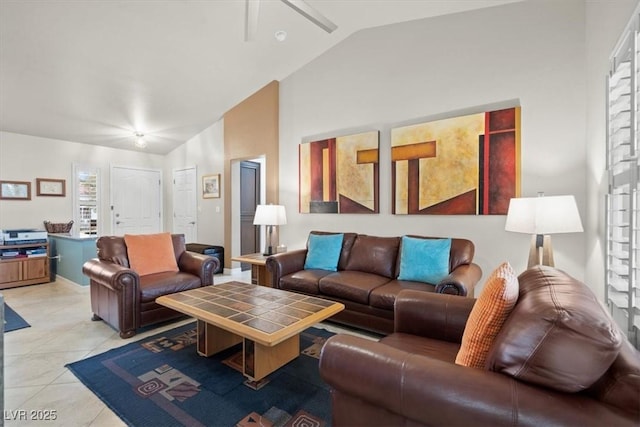 living room with light tile patterned flooring and lofted ceiling