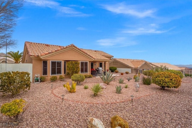 rear view of property with a patio area