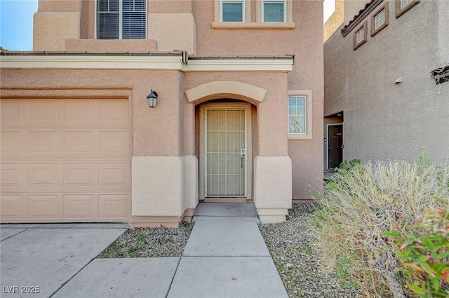 property entrance featuring a garage