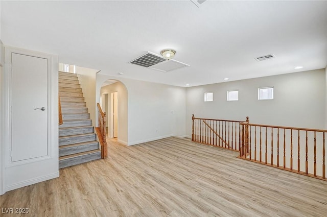 basement featuring light wood-type flooring