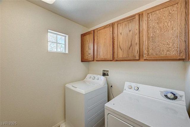 laundry room with cabinets and independent washer and dryer