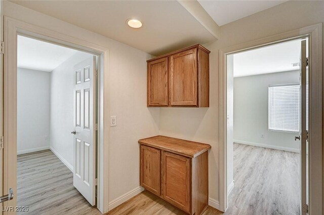 hall featuring light hardwood / wood-style floors