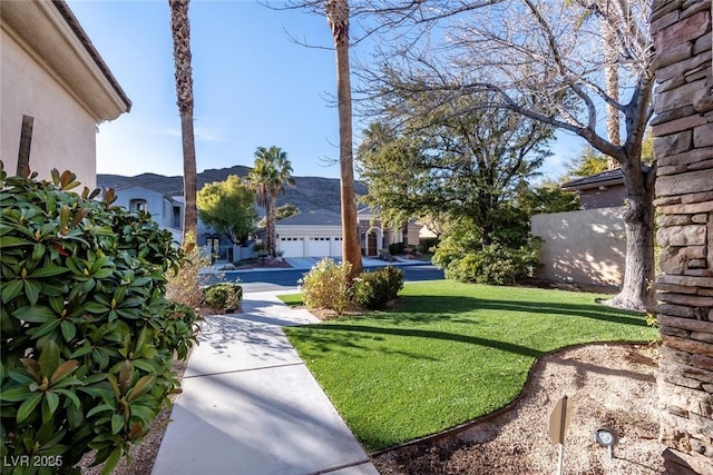 view of yard with an attached garage