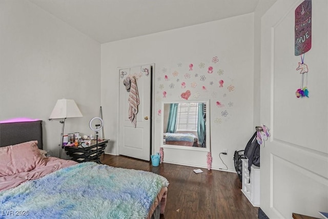 bedroom featuring dark hardwood / wood-style floors