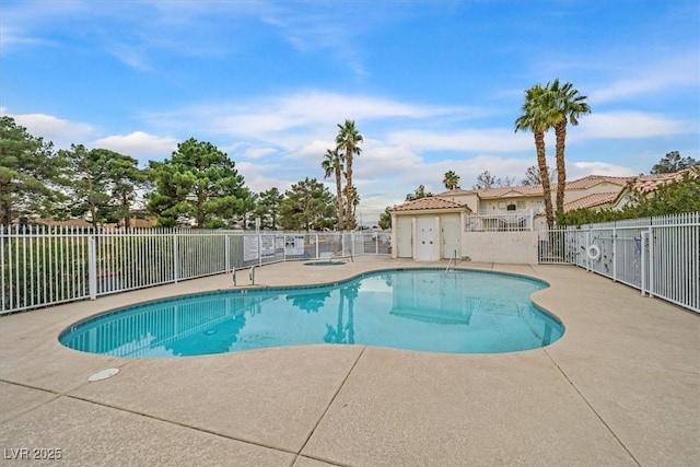 view of swimming pool featuring a patio