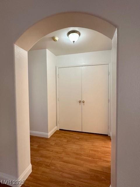 hallway featuring light wood-type flooring