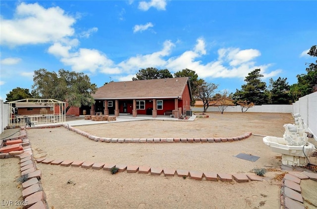 back of house featuring a patio