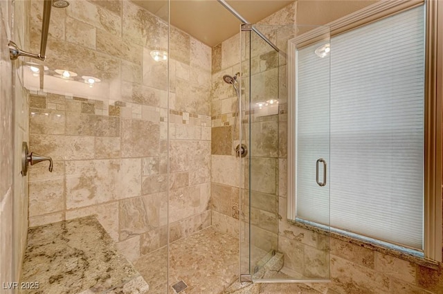 bathroom with an enclosed shower