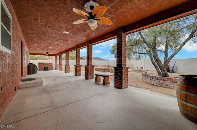 view of patio with ceiling fan