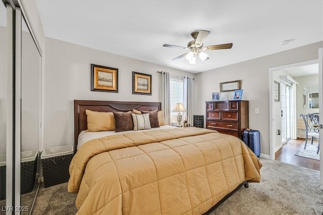 bedroom featuring hardwood / wood-style flooring, a closet, and ceiling fan