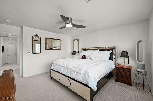 bedroom with light carpet and ceiling fan