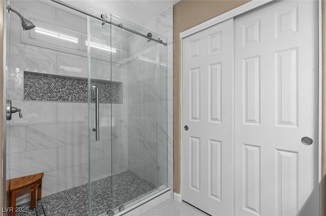 bathroom with an enclosed shower