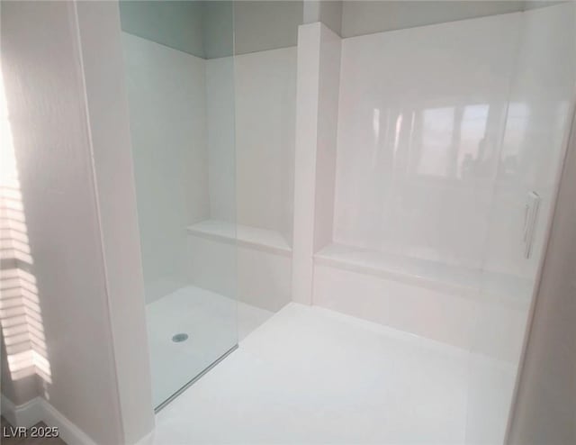 bathroom with walk in shower