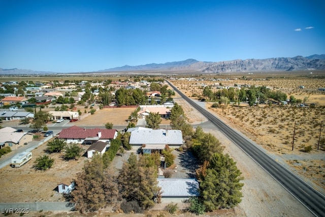 bird's eye view with a mountain view