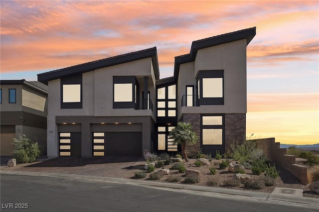 modern home featuring a garage