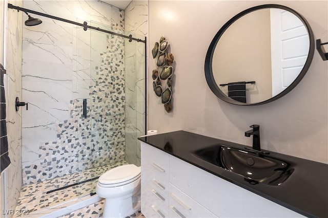 bathroom featuring vanity, toilet, and walk in shower