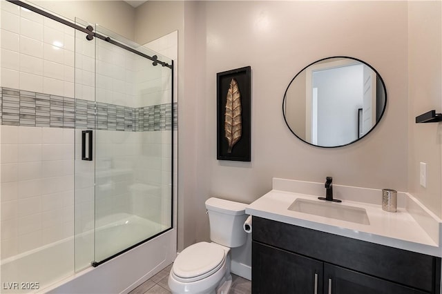 full bathroom with enclosed tub / shower combo, vanity, and toilet