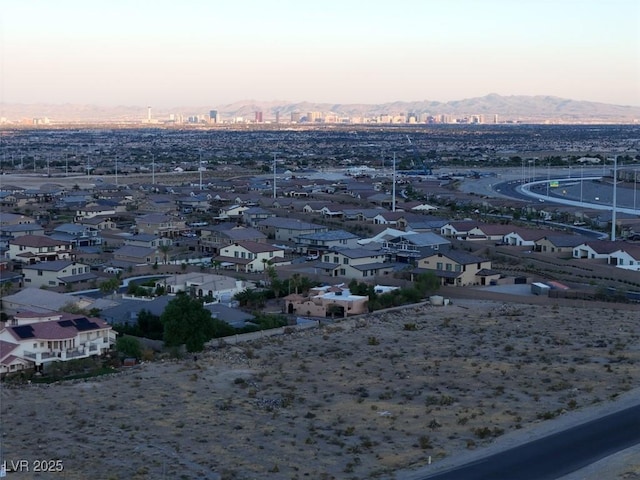 aerial view at dusk with a mountain view