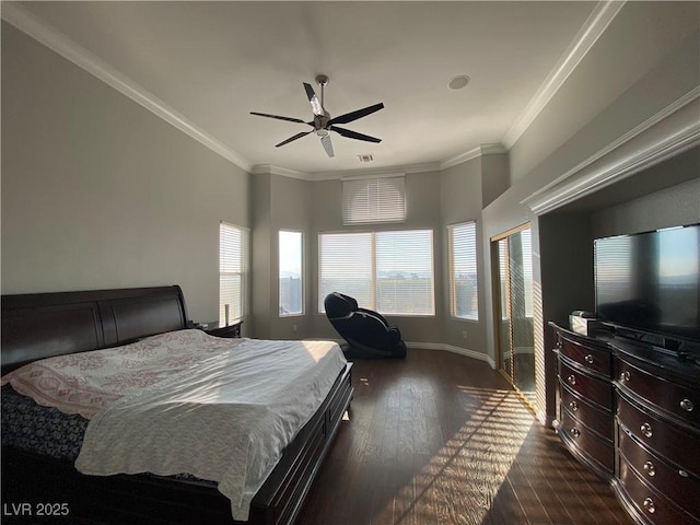 bedroom featuring crown molding, ceiling fan, and dark wood-type flooring