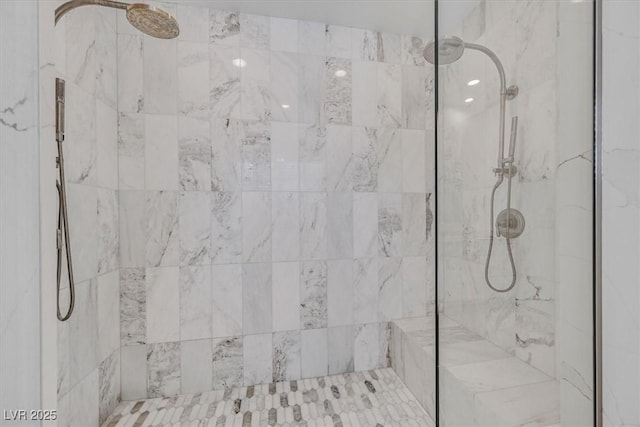 full bathroom featuring a tile shower