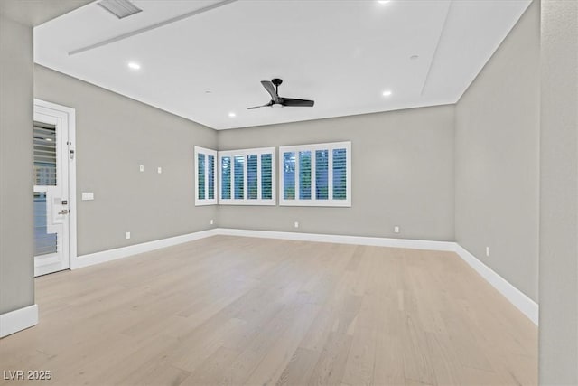 empty room featuring baseboards, recessed lighting, a ceiling fan, and light wood-style floors