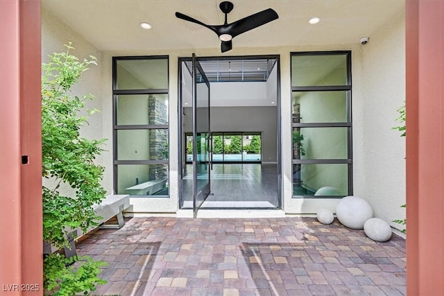 property entrance featuring stucco siding