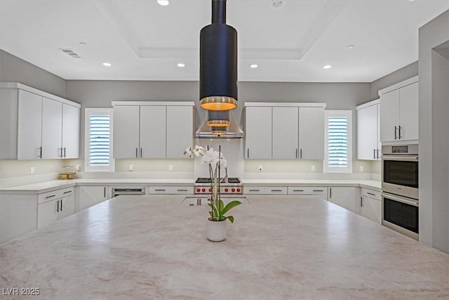 kitchen featuring white cabinetry and recessed lighting