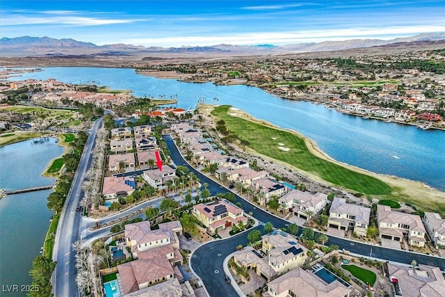 bird's eye view featuring a residential view and a water and mountain view