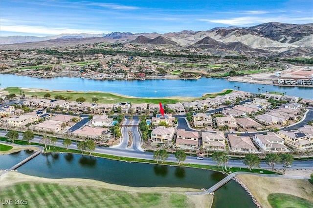 aerial view with a residential view and a water and mountain view