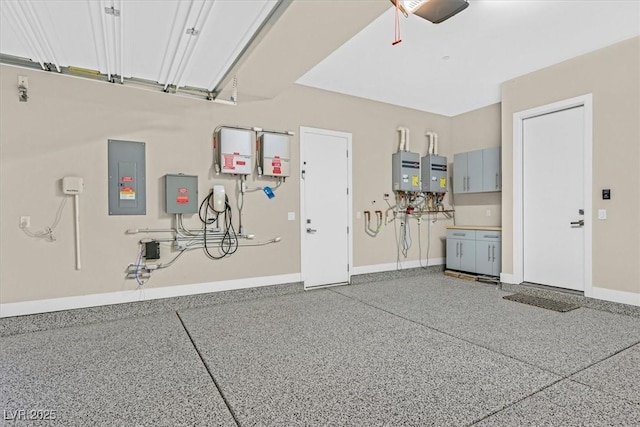 garage featuring water heater, electric panel, baseboards, and a garage door opener