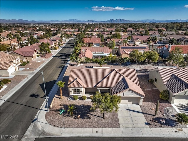 drone / aerial view featuring a mountain view