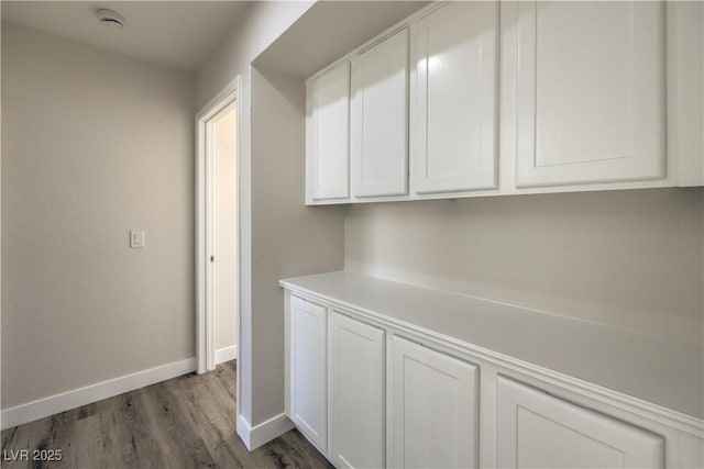 hall featuring dark wood-type flooring