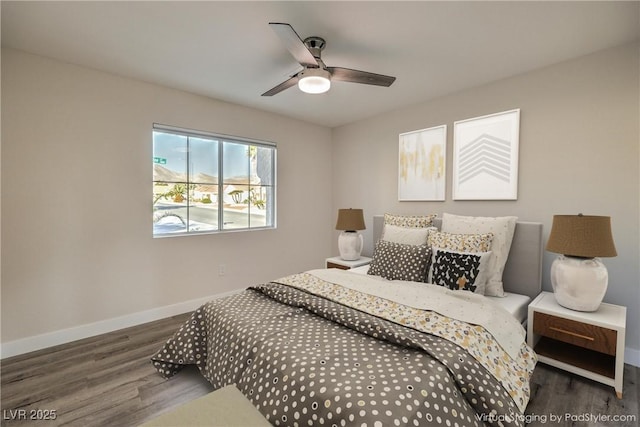 bedroom featuring ceiling fan and dark hardwood / wood-style flooring