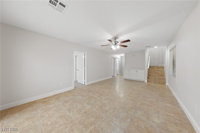 spare room with ceiling fan