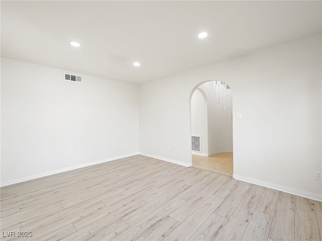 empty room with light wood-type flooring