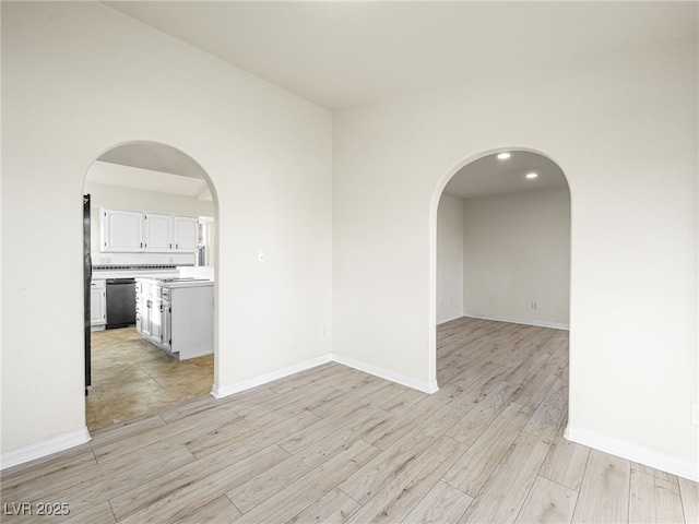 empty room with light wood-type flooring