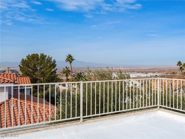 balcony featuring a mountain view