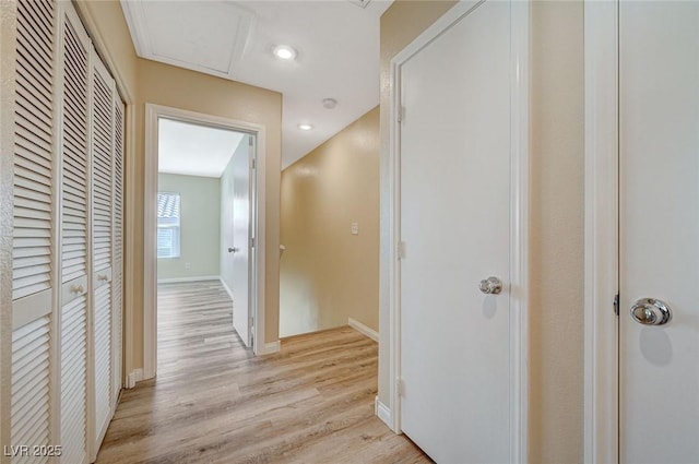 hall with light wood-type flooring