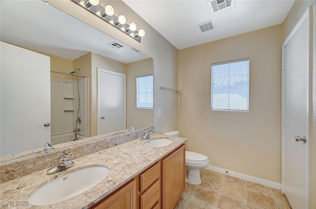 full bathroom with shower / bathing tub combination, vanity, and toilet