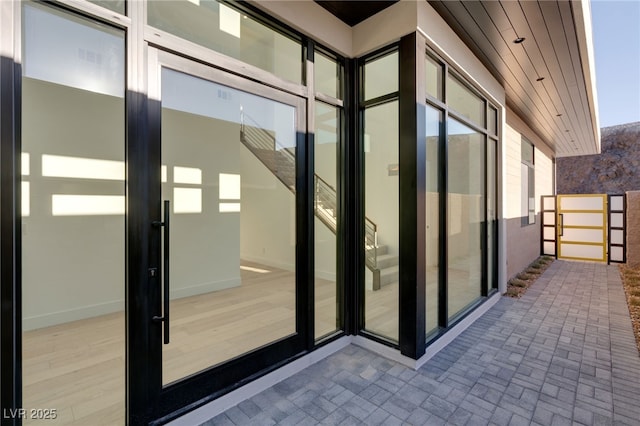 property entrance with visible vents