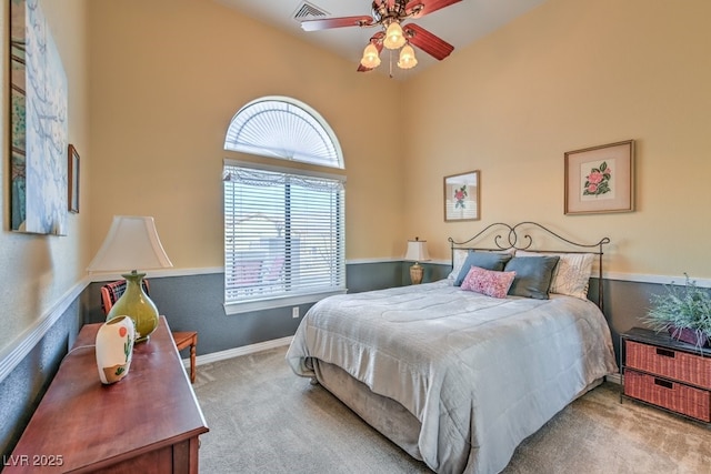 bedroom with light colored carpet