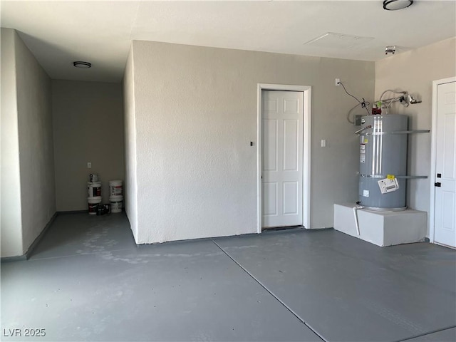 garage with strapped water heater