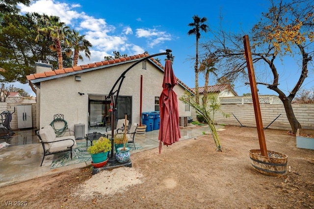 rear view of house with a patio area