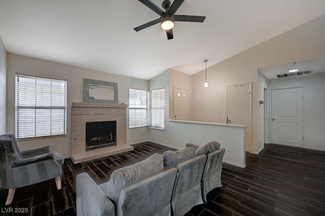 living room with vaulted ceiling and ceiling fan