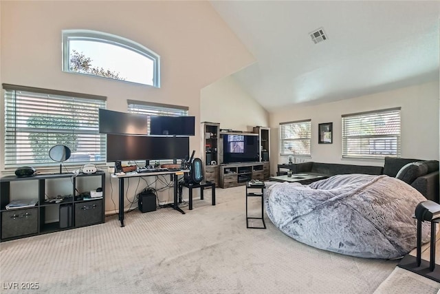 carpeted living room featuring high vaulted ceiling