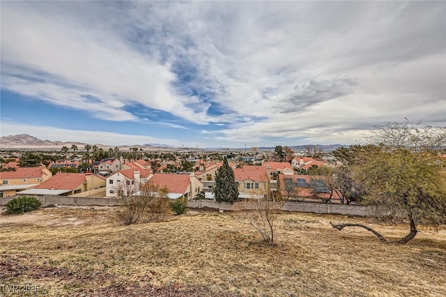 view of yard with a mountain view and a residential view