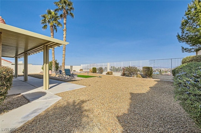 view of yard featuring a patio and a fenced backyard