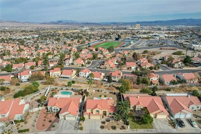 bird's eye view featuring a mountain view and a residential view