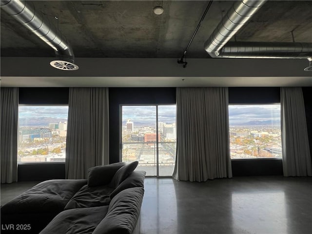 living room featuring concrete floors