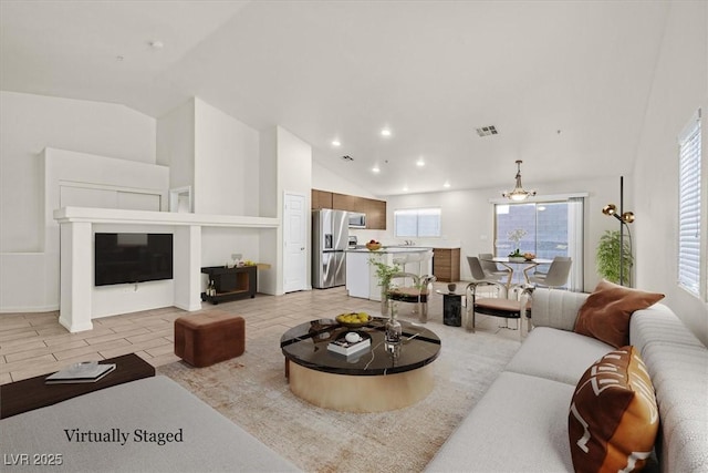 living room with vaulted ceiling